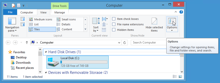 open 'Windows Explorer' using Win+E keys, click on 'View' menu, 'Options'